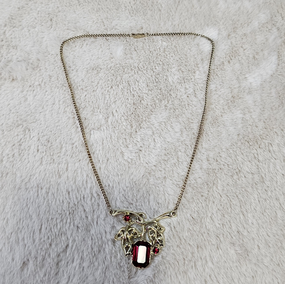 Elegant Gold Necklace with Red Stones